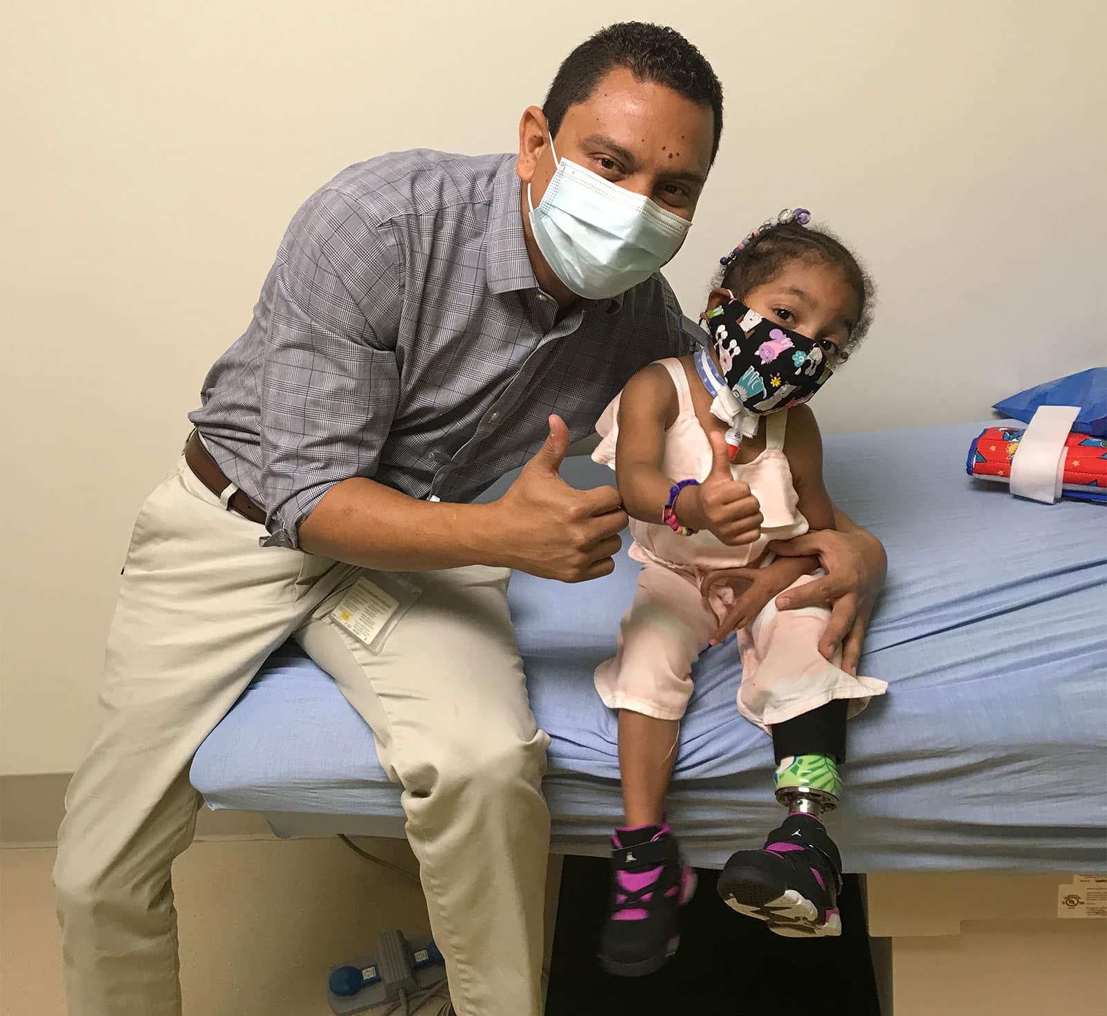 Girl with pediatric leg prosthetic