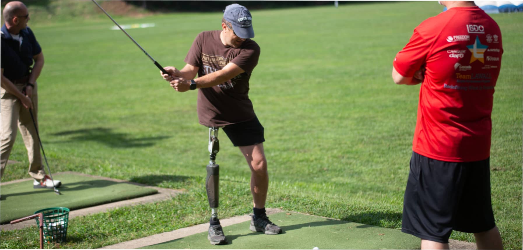Picture of a man with prosthetic leg playing golf | Lawall Prosthetic & Orthotic Services