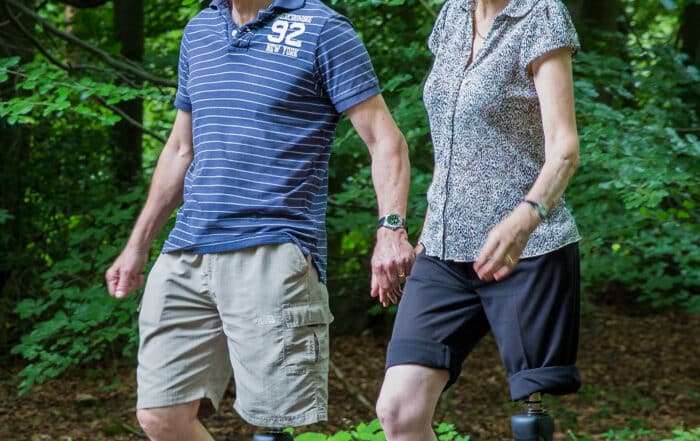 Couple walking with Microprocessor Knees
